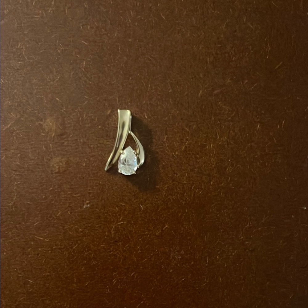 Elegant Gold and Silver Pendant with Clear Gemstone